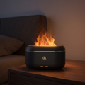 Sleen flame diffuser with orange flame effect on a walnut bedside table